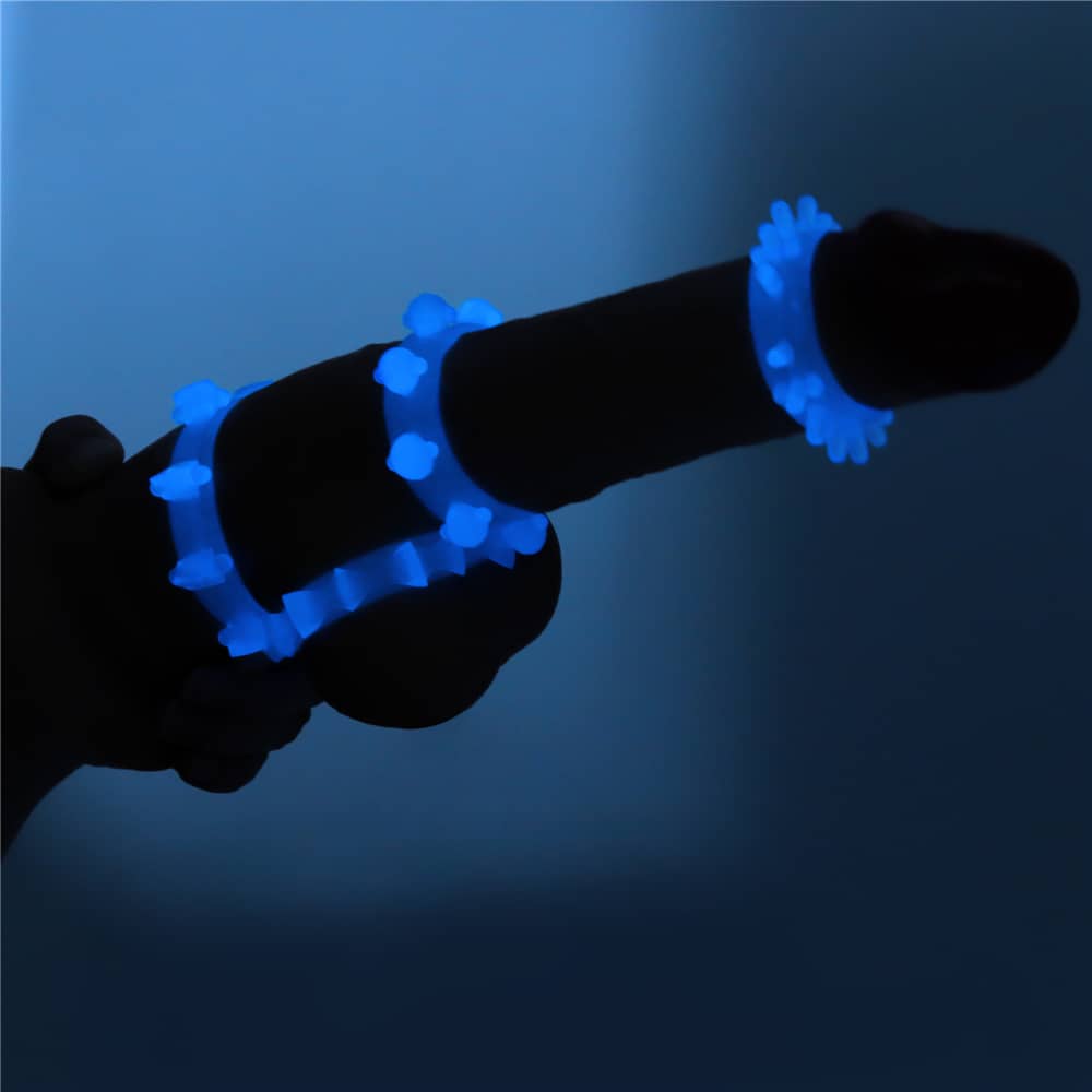 The lumino play stretchy penis ring 4 pcs glow the blue light in the dark