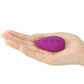 The remote control of the body safe remote control vibrator lays flat on the palm