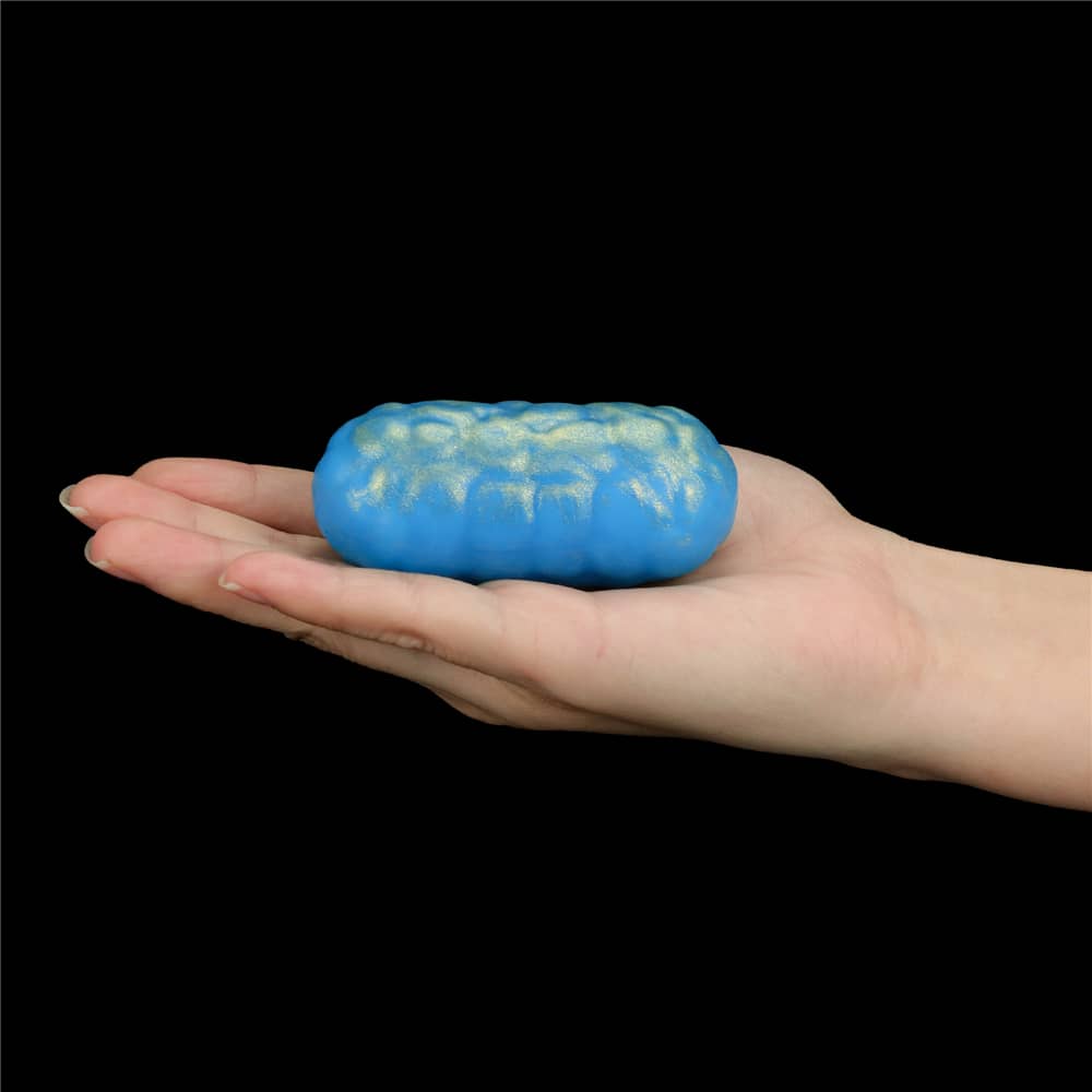The bumpy ball of the ocean toner egg set is put on the palm