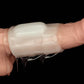 The vibrating penis sleeve worn on dildo with lube