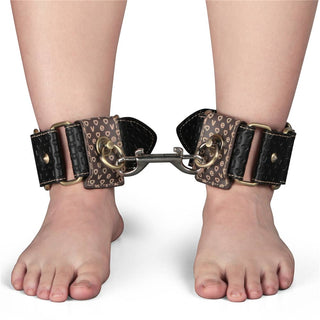 The rebellion reign ankle cuffs fits most men and women