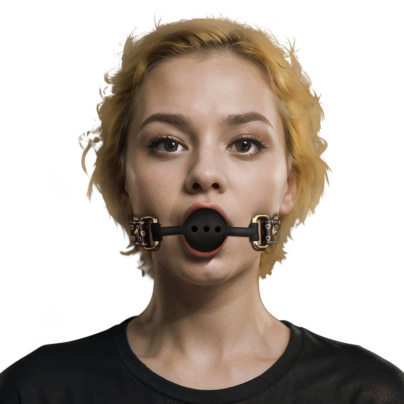 A woman wears the rebellion reign ball gag