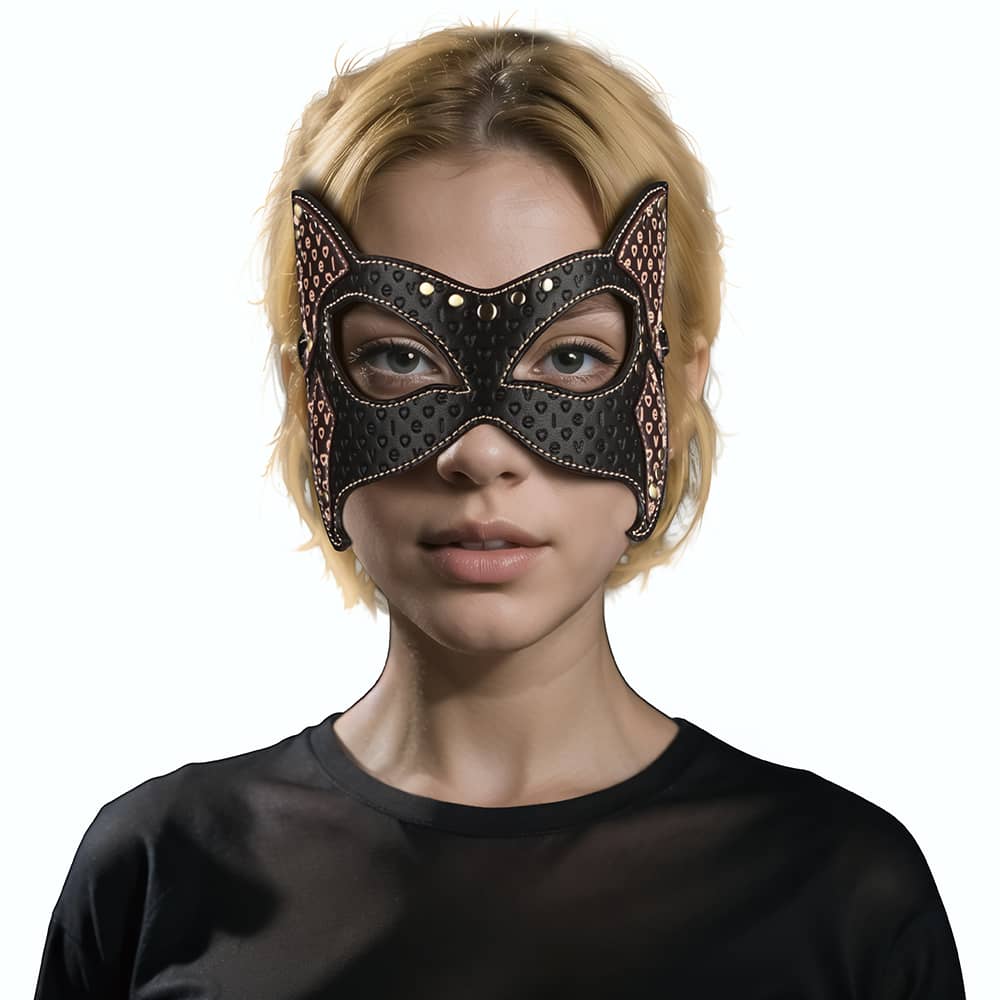 A woman wears the rebellion reign cat mask