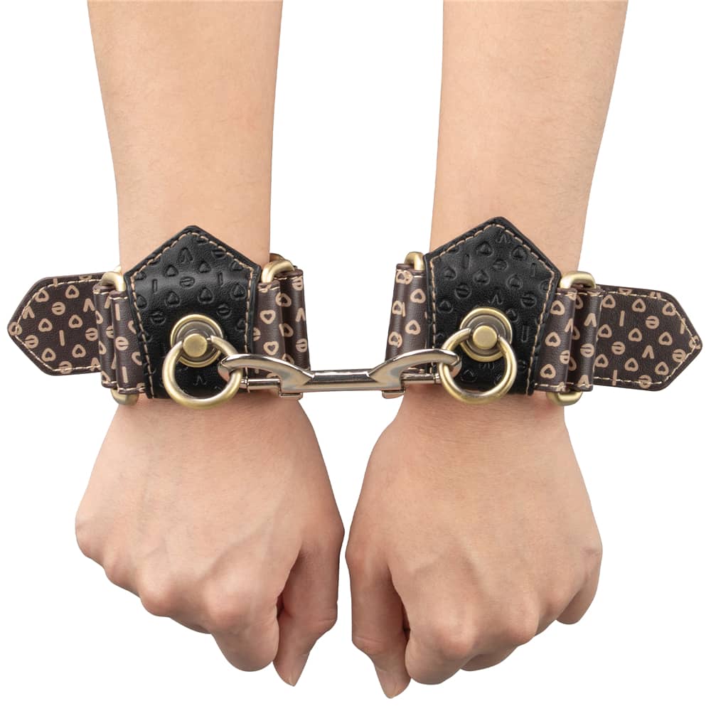 A person wears the rebellion reign handcuffs