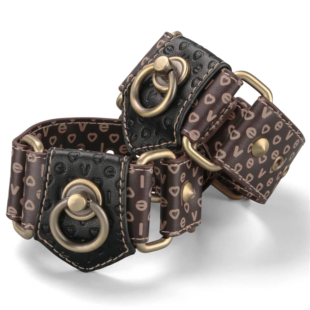 The rebellion reign handcuffs is crafted from sophisticated brown PU