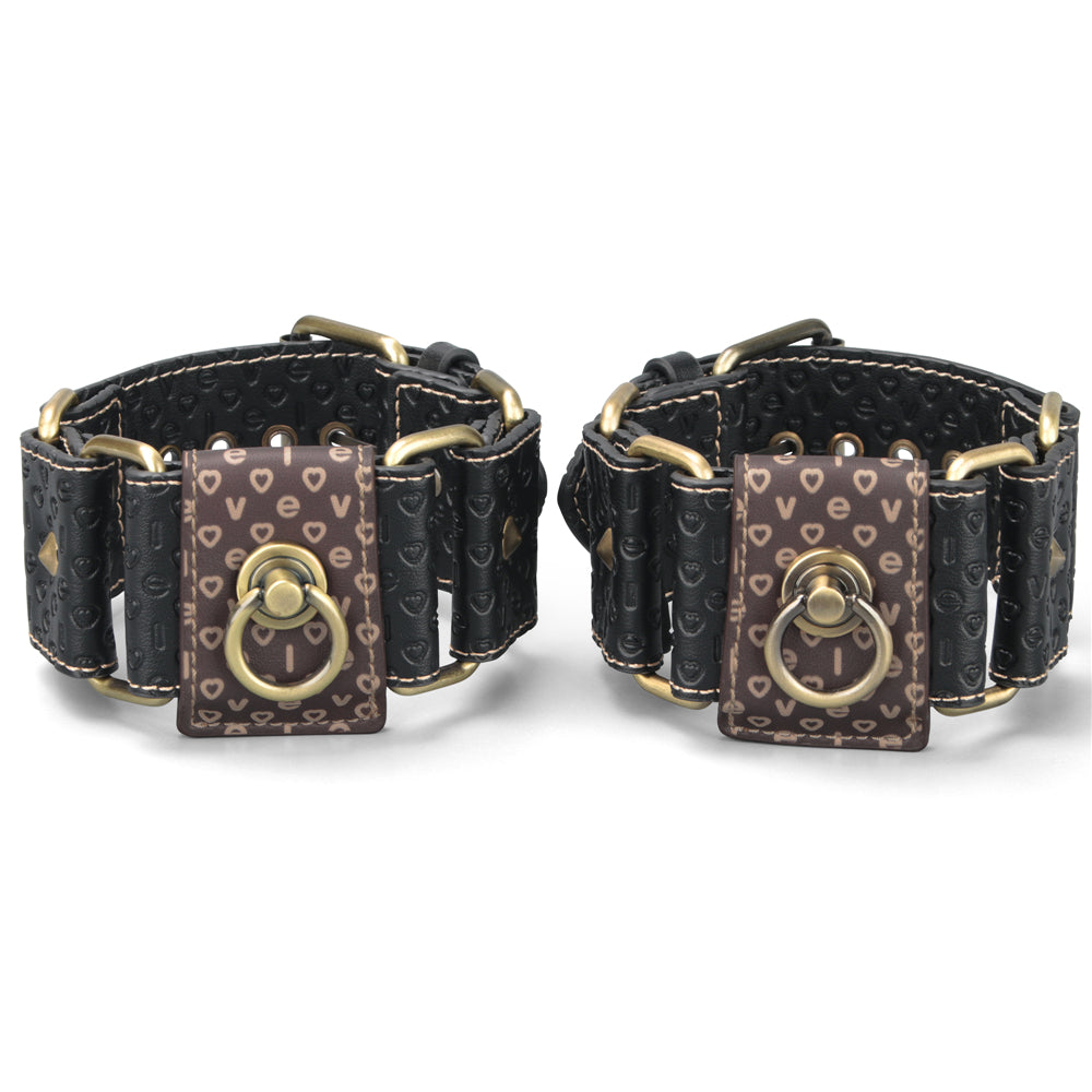 The rebellion reign hogtie set comprises a pair of ankle cuffs