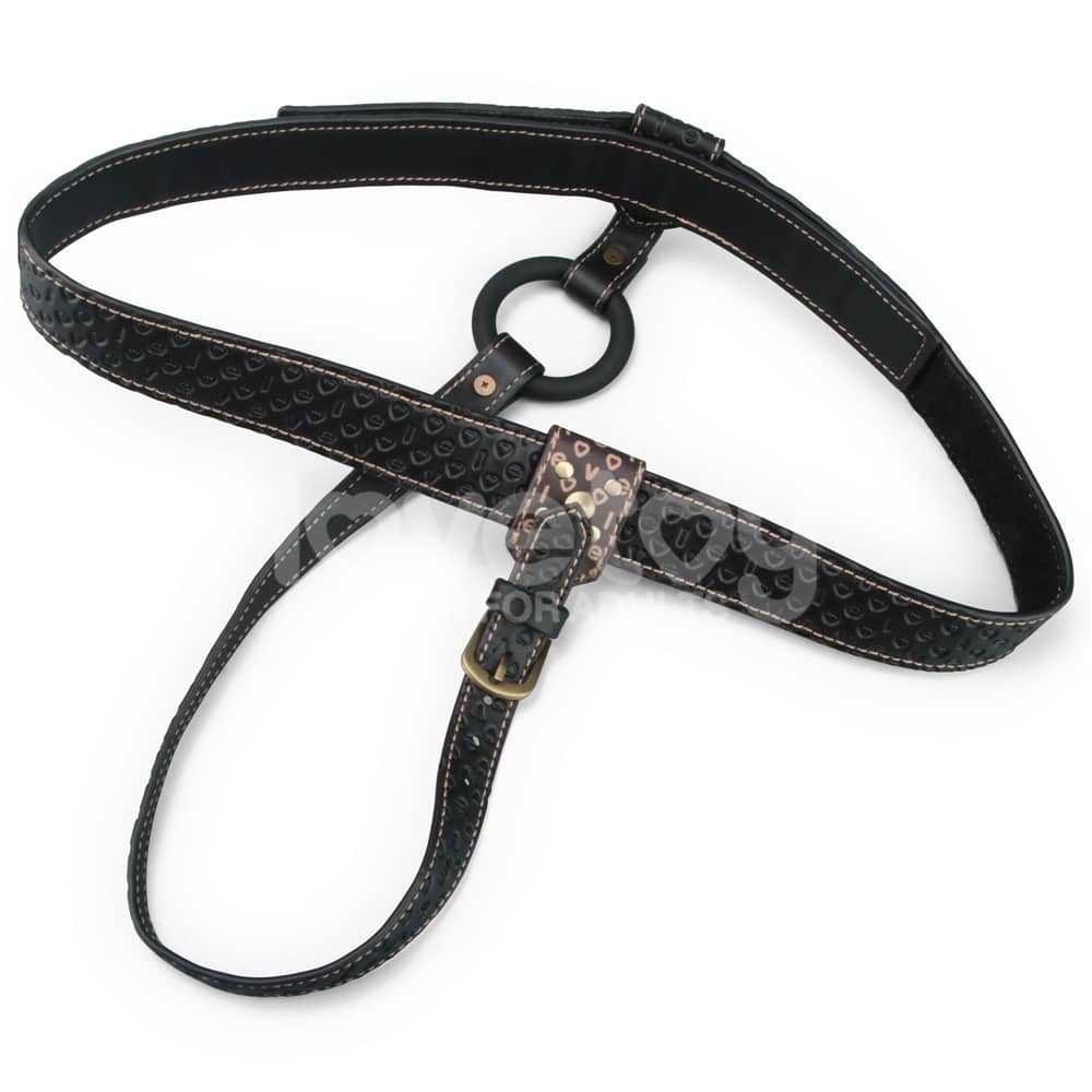 The rebellion reign strap on harness is put on the floor
