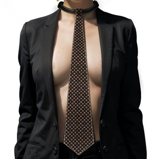 A woman wears the rebellion reign tie collar
