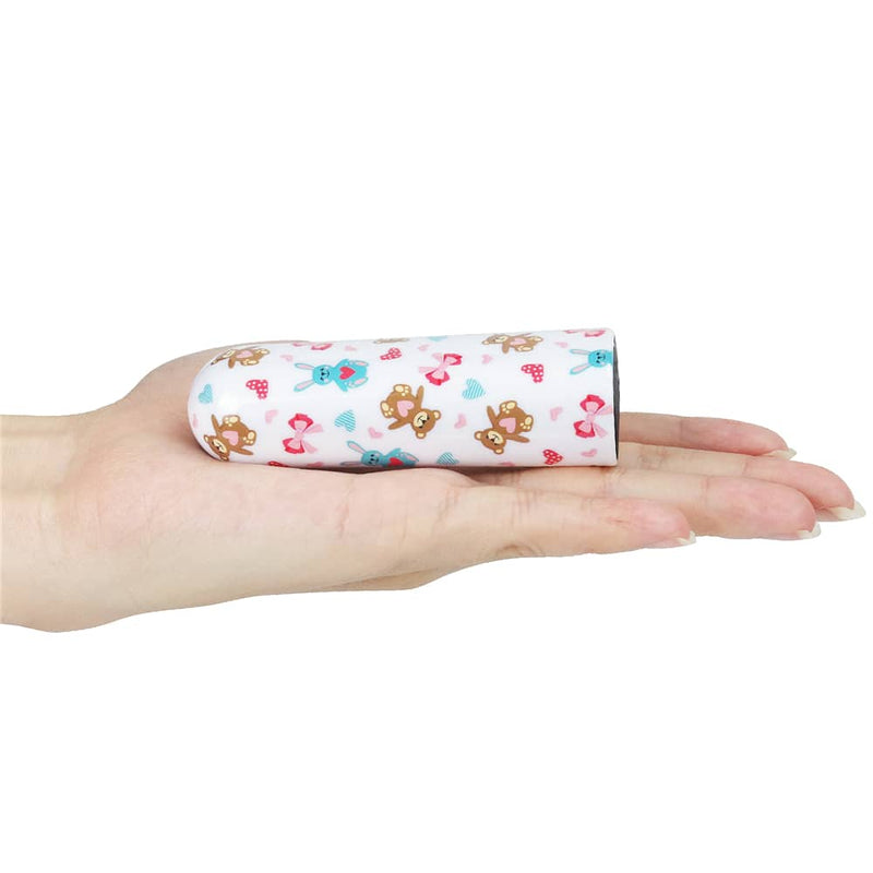 The rechargeable bear massager vibrator lays flat on the palm