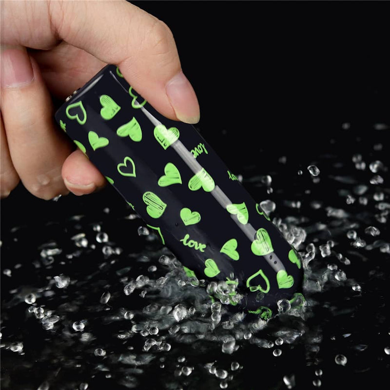 The glow in the dark heart vibrator is vibrating in the water
