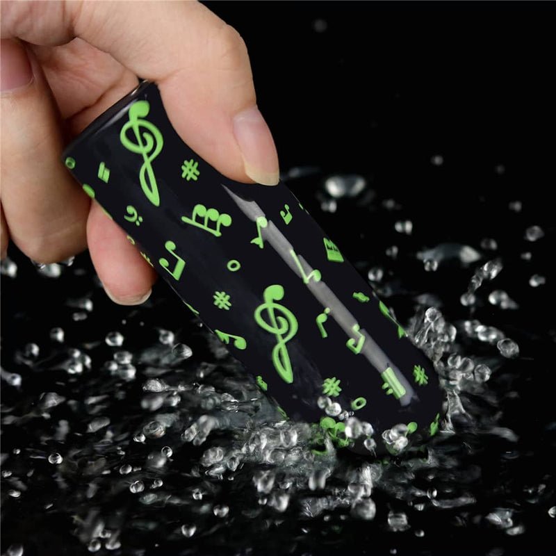 The rechargeable luminous massager is vibrating in the water