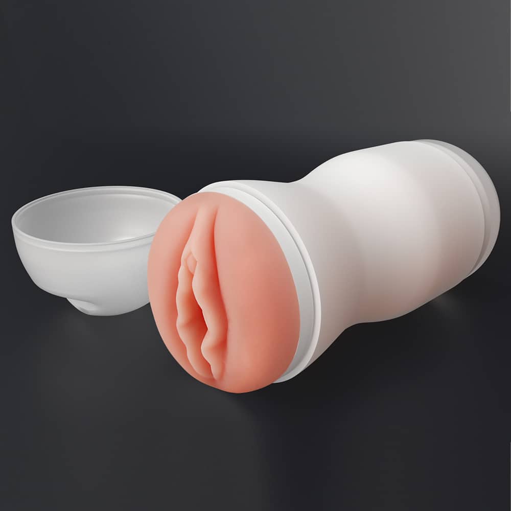 The vagina lotus tunnel vibrating masturbator lays flat with lid open