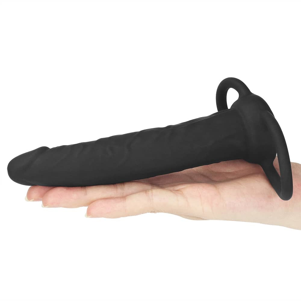 The silicone fantasy double prober anal plug is put on the palm