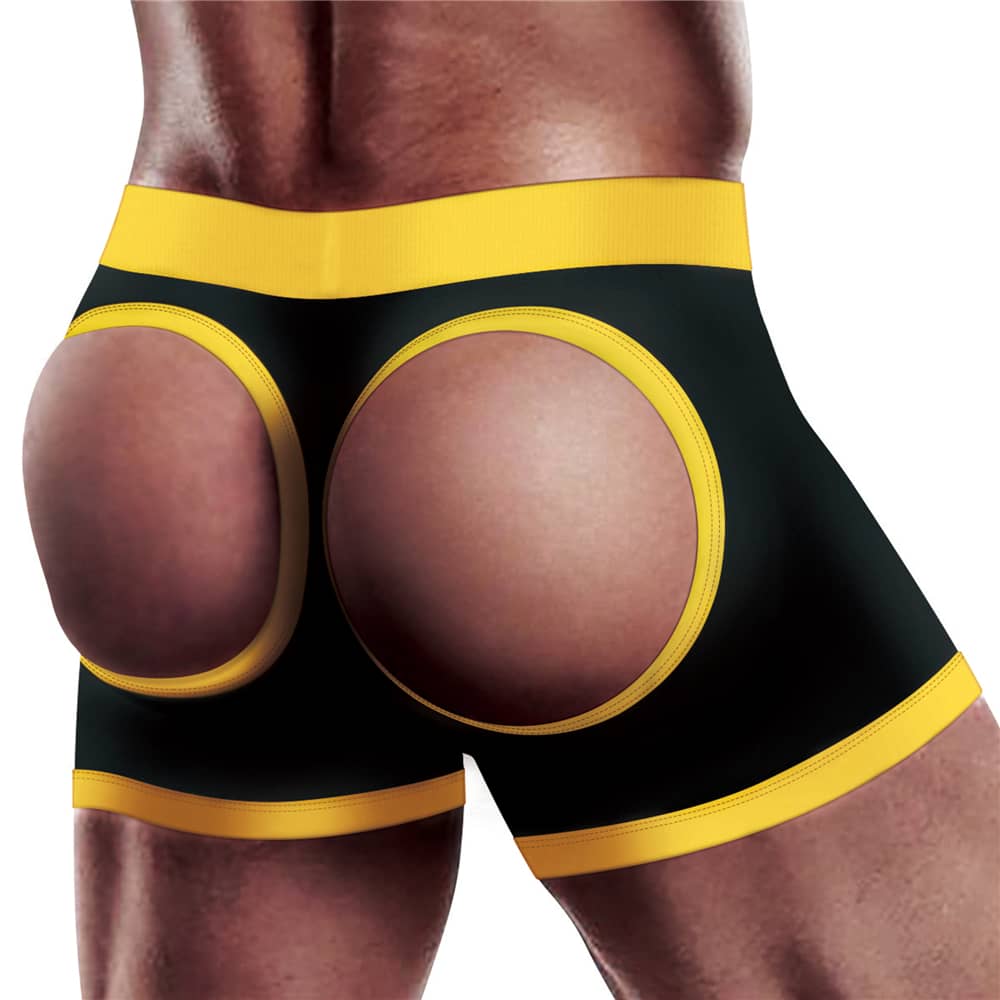 The back of a man wearing the strap on harness shorts for couple