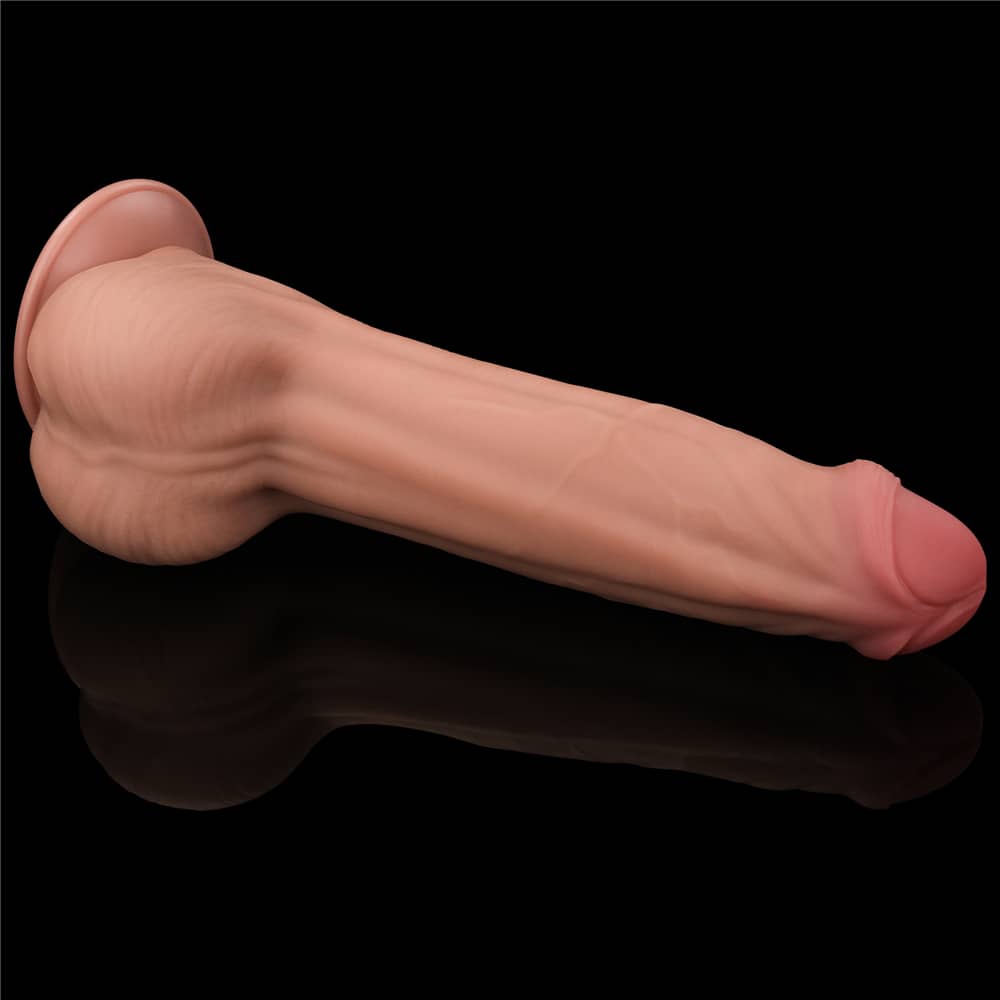 The 11.5 inches sliding skin dual layer dong shows its back and balls 