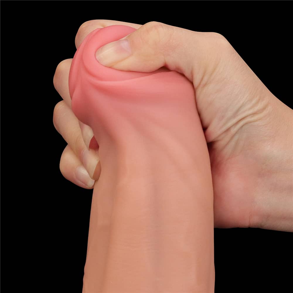 The bulging but soft head of the 11.5 inches sliding skin dual layer dong