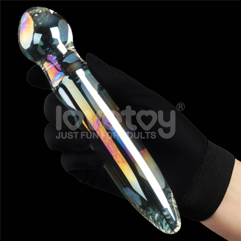 A man holds the twilight gleam prism glass dildo 