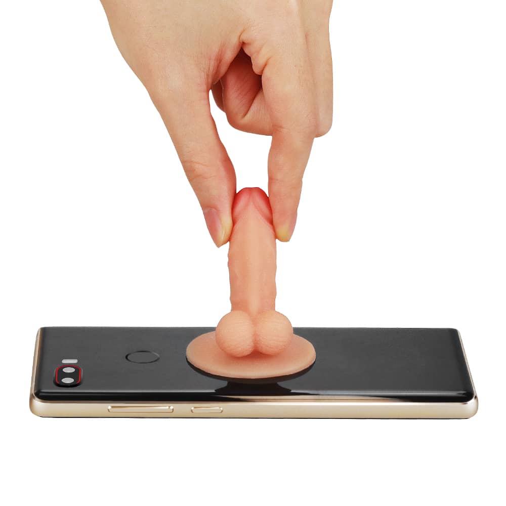 The universal pecker stand holder sticks to the phone