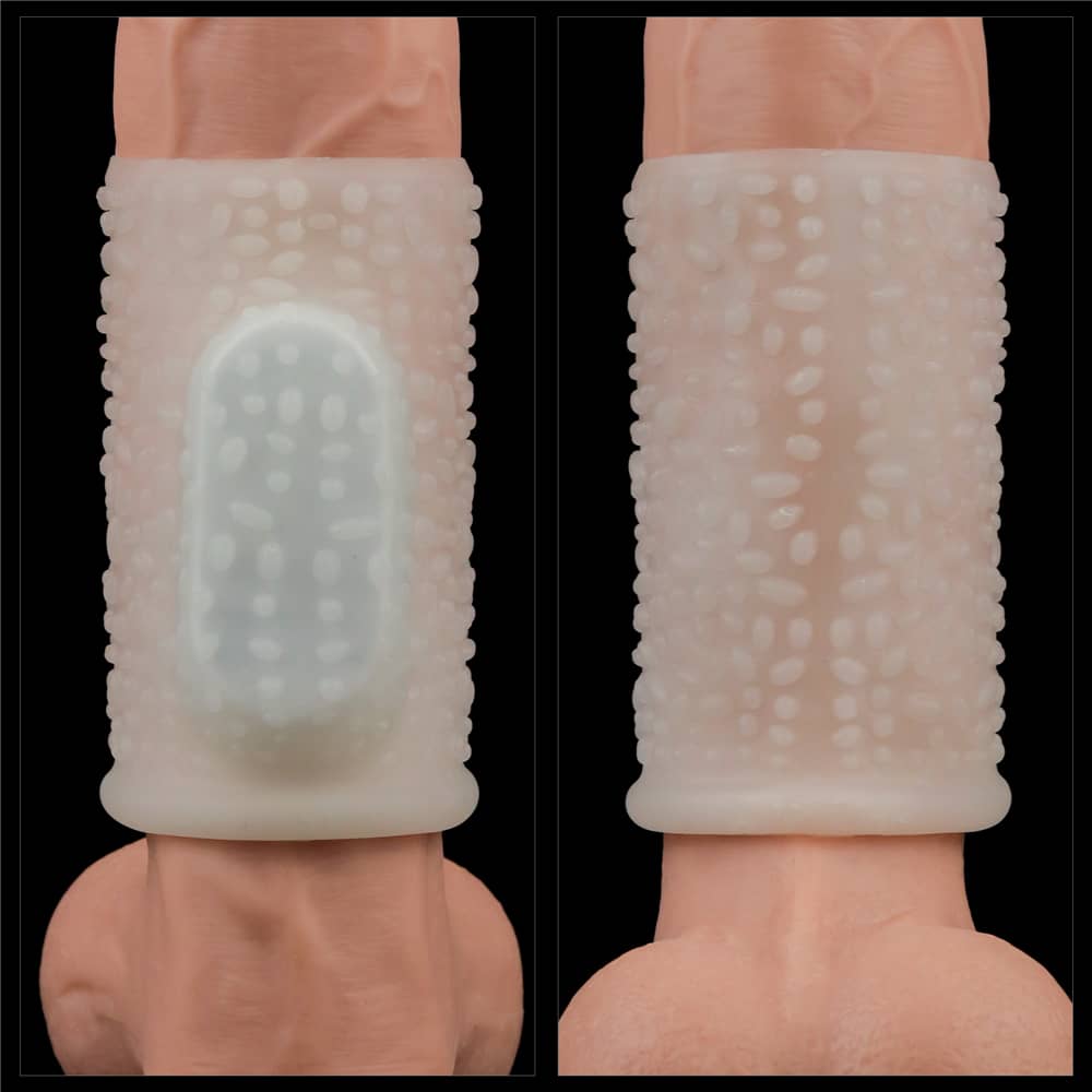 The front and back of the white vibrating drip knights ring  