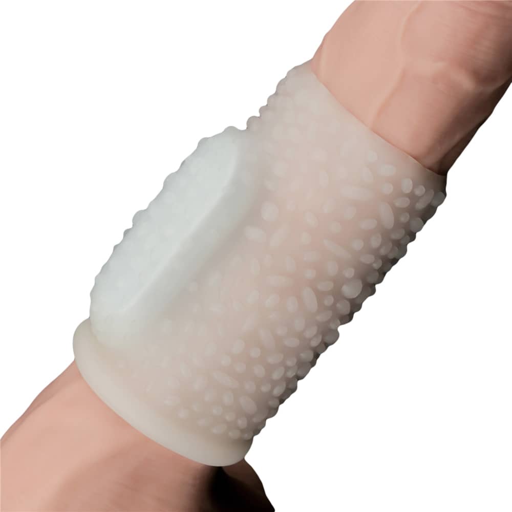 The white vibrating drip knights ring  worn on dildo