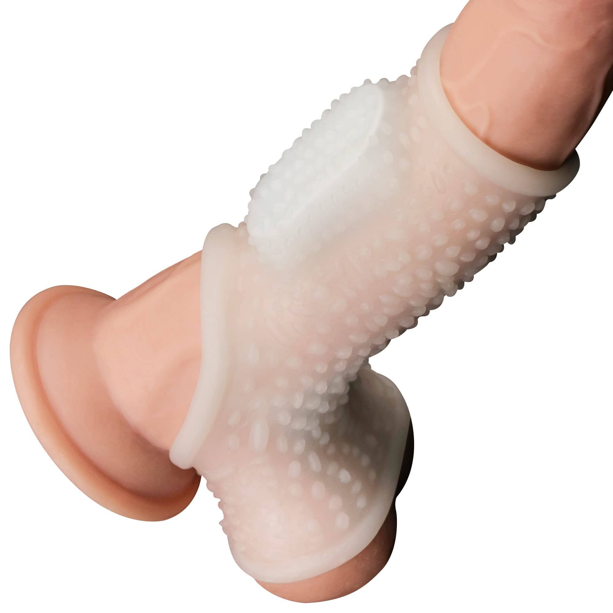The vibrating drip cock sleeve with scrotum sleeve worn on dildo