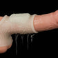 The vibrating drip cock sleeve with scrotum sleeve worn on dildo with lube
