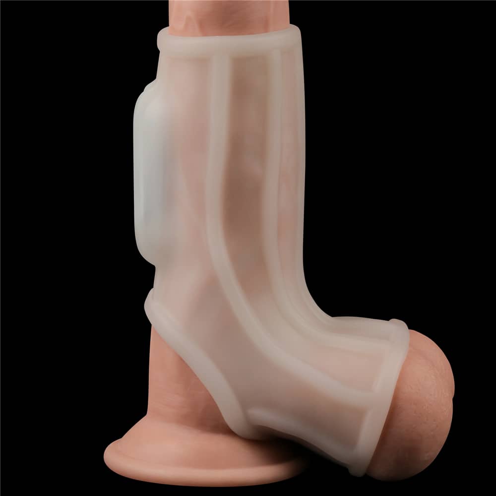 The white vibrating ridge penis ring with scrotum sleeve  worn on the upright dildo