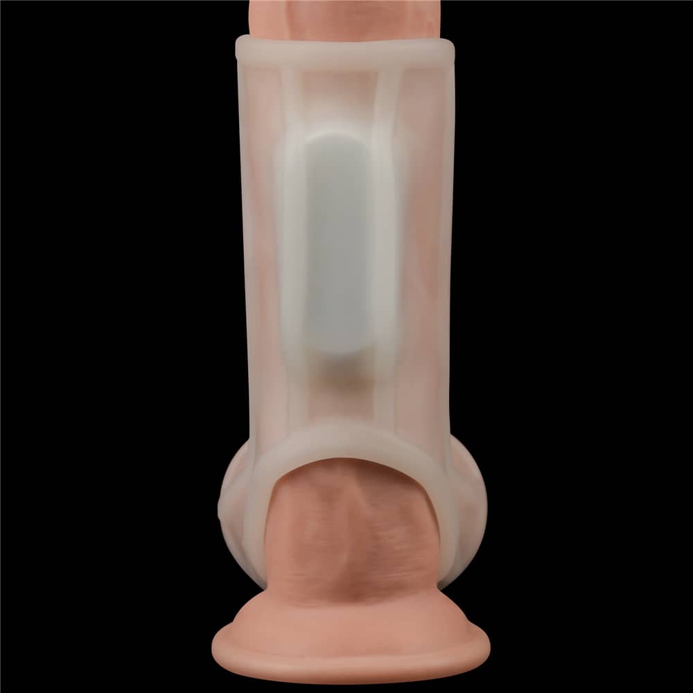 An inserted vibrator in the white vibrating ridge penis ring with scrotum sleeve  