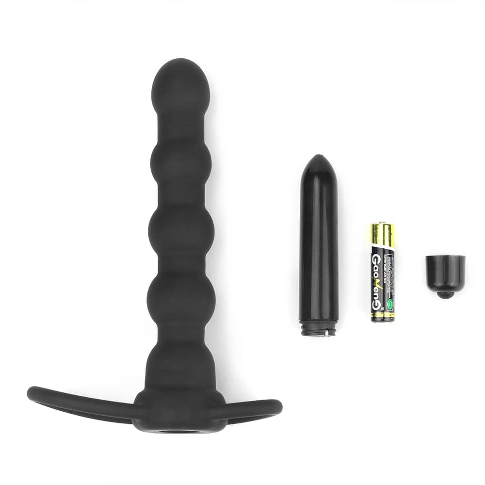The vibrating rock balled double prober anal beads lays flat with its vibrator