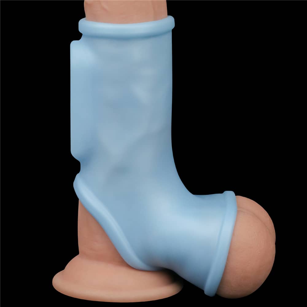The vibrating silk cock ring with scrotum sleeve cuddles the upright dildo