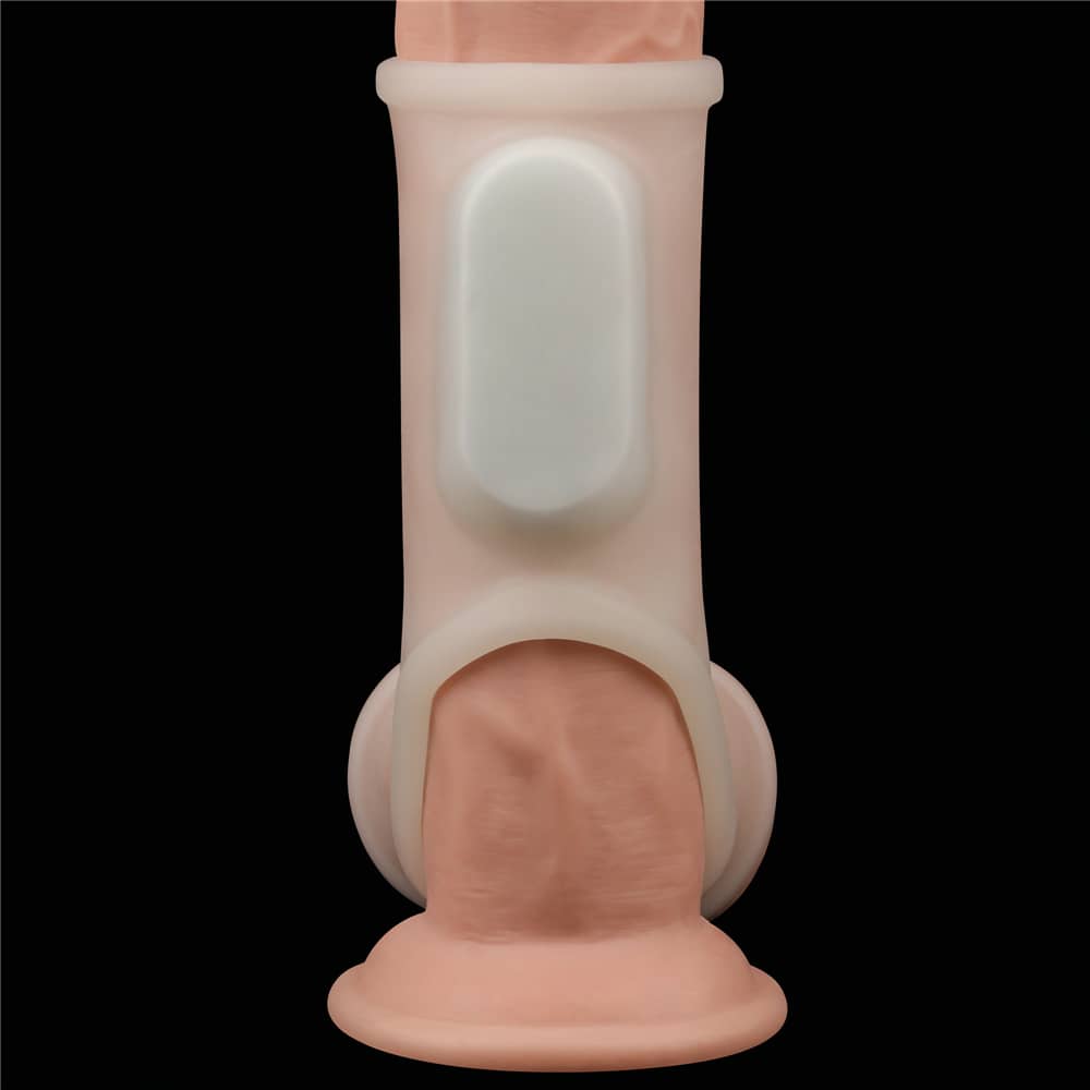 An inserted vibrator in this white  vibrating silk cock ring with scrotum sleeve 