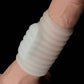 The wave vibrating penis sleeve cuddles the dildo with its comfortable wrapping