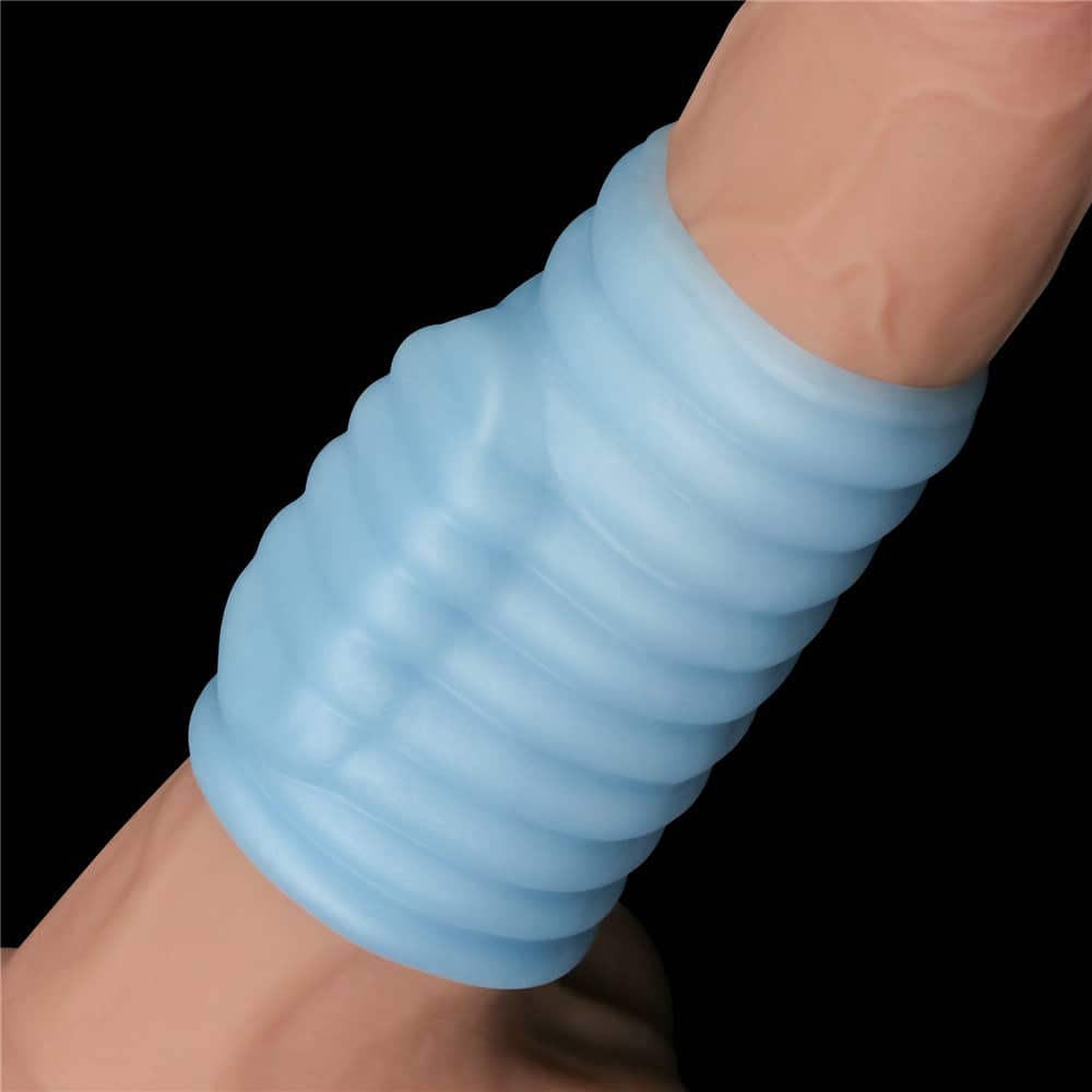 The dildo wears the blue vibrating wave knights ring 