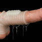 The wave vibrating knights ring with scrotum sleeve worn on dildo with lube