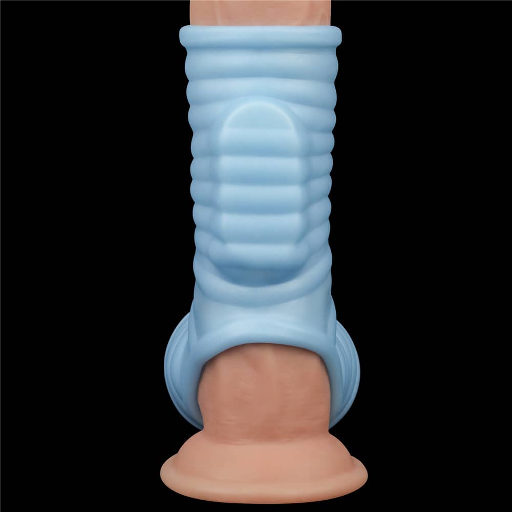 An inserted vibrator in this blue vibrating wave cock ring with scrotum sleeve   