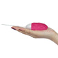 The wireless remote control rechargeable vibrator lays flat on the palm
