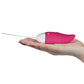 The pink wireless remote control vibrator for women lays flat on the palm